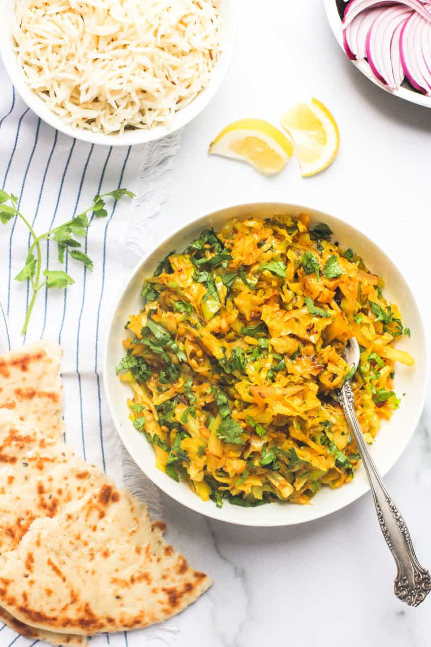Patta Gobi sabzi served with naan and cumin rice