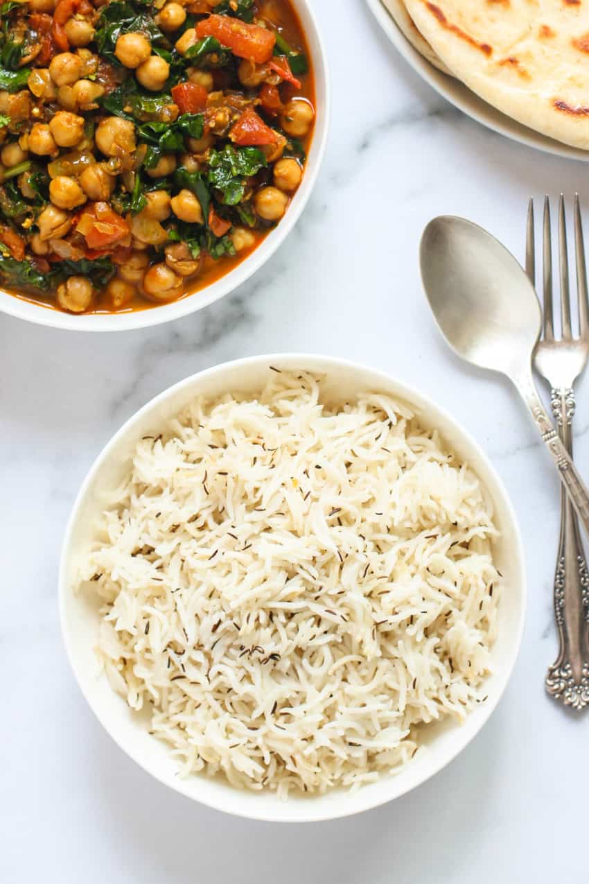 jeera rice served with chickpea curry
