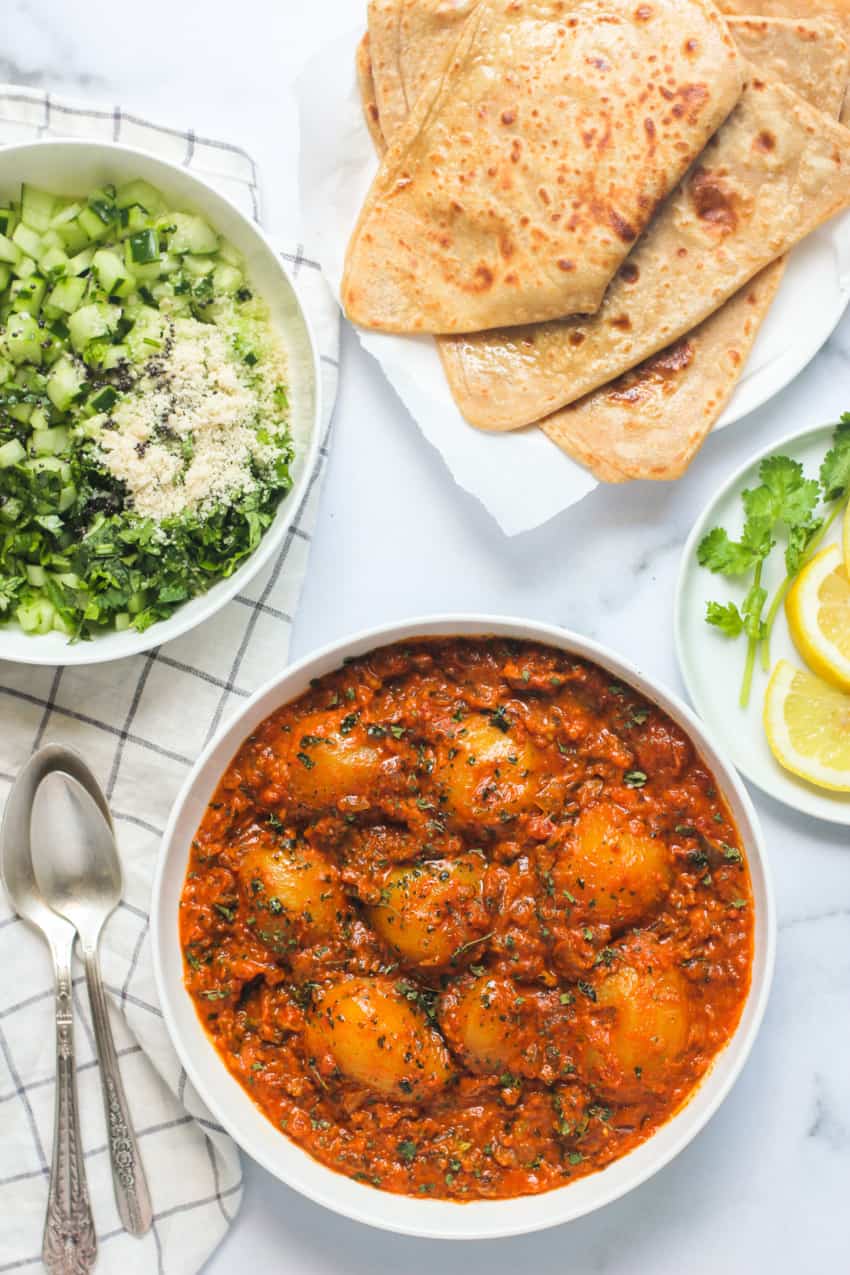 dum aloo served with parathas and salald