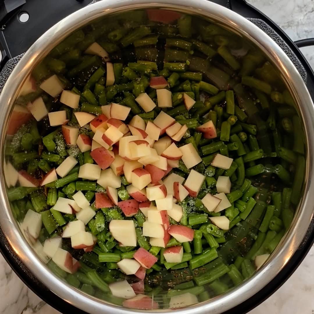 beans and potatoes added to Instant Pot insert 