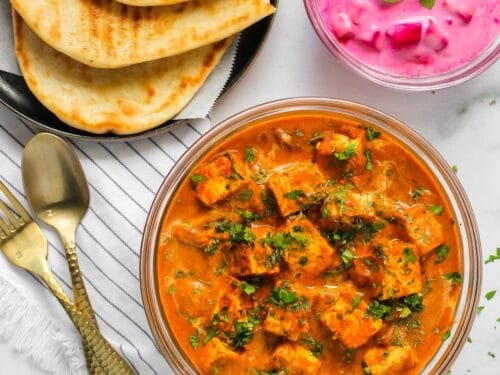 paneer makhani served with raita and naan