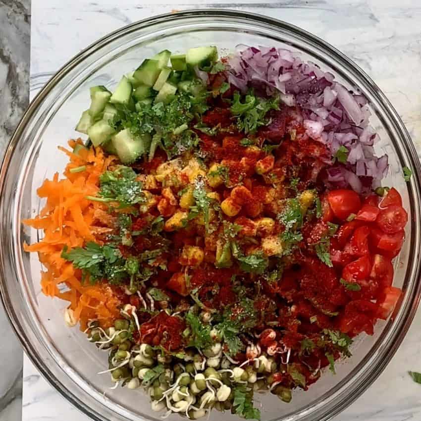 mung bean salad veggies in a bowl topped with spices 