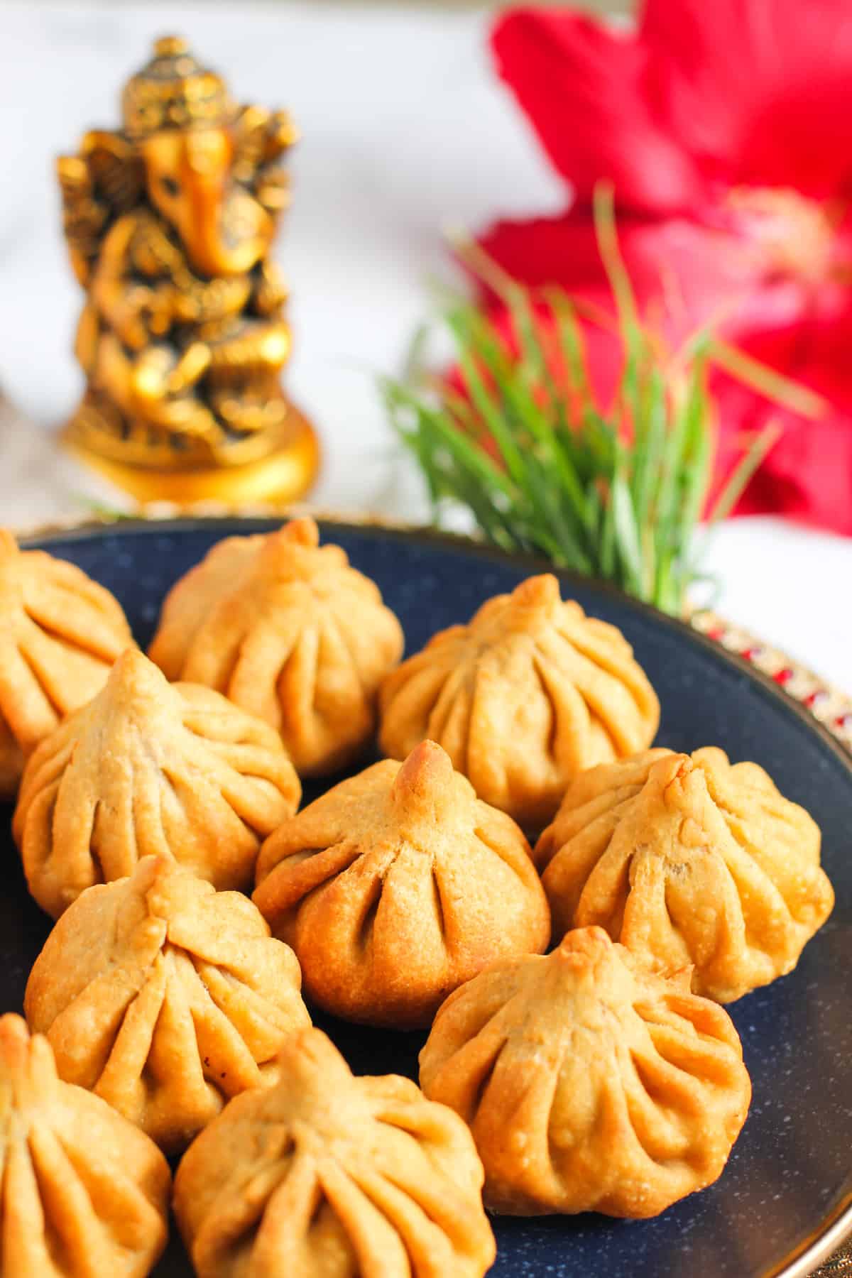 Fried modak in a blue plate 