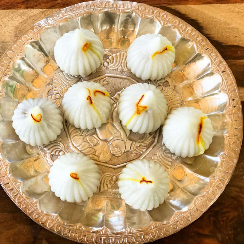 ukadiche modak in a silver plate 