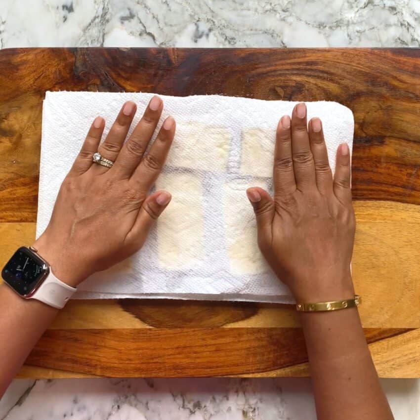 dab excess moisture from tofu with paper towels 