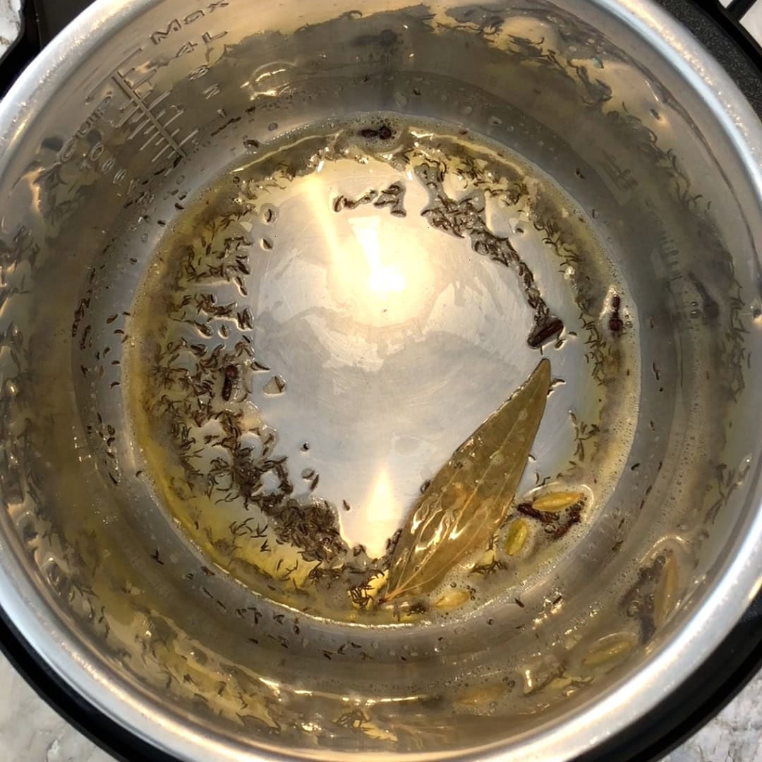 whole spices sauteed in ghee 
