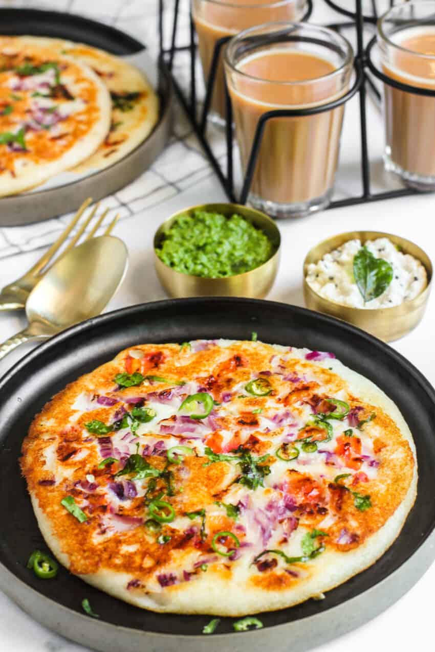 Uttapam served with chutneys and tea