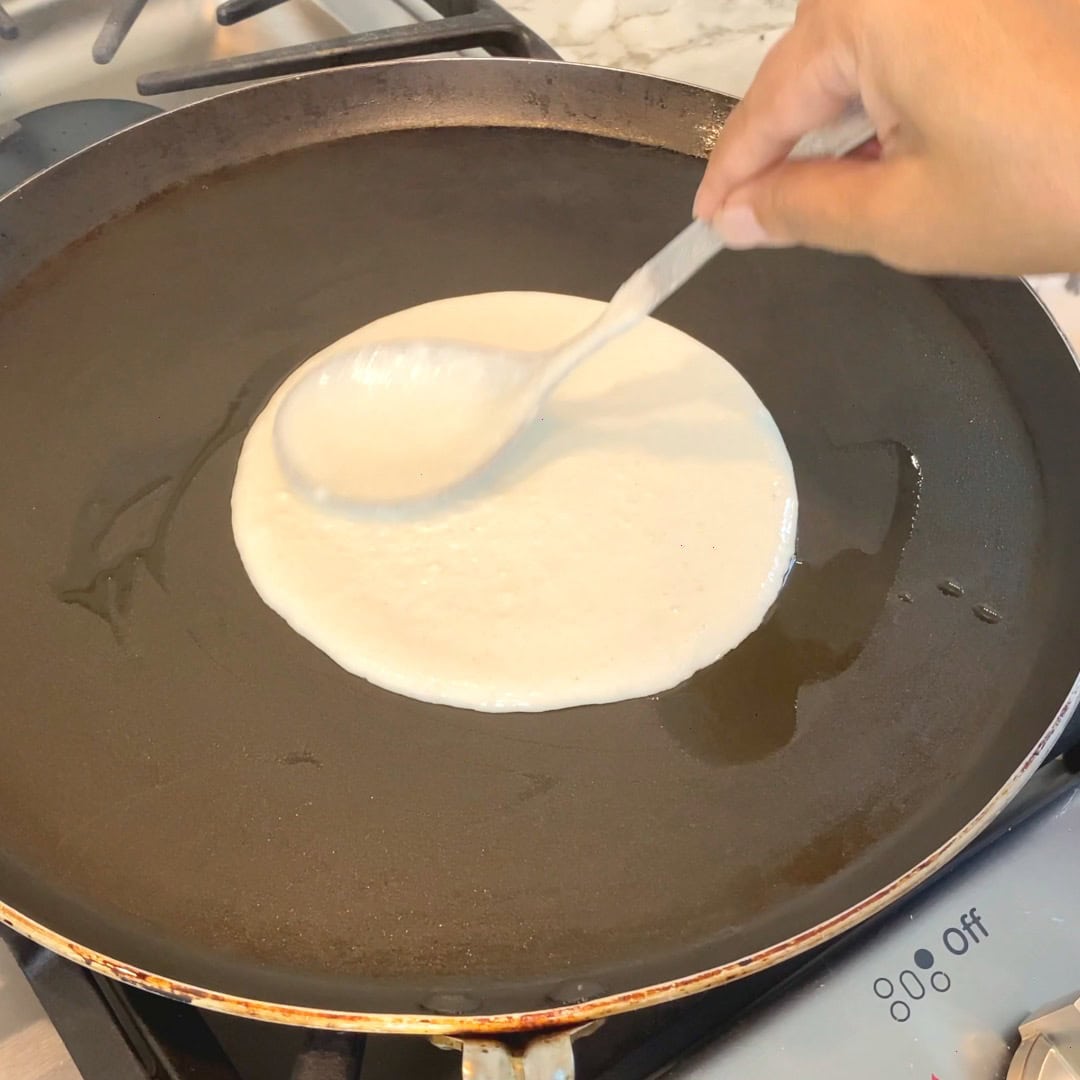 spreading batter on pan 