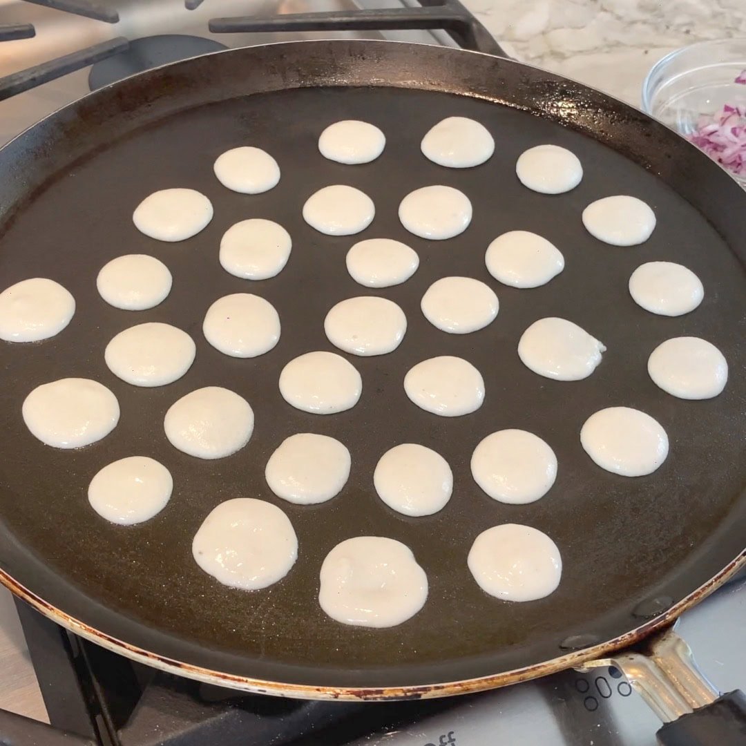mini uttapam batter on pan