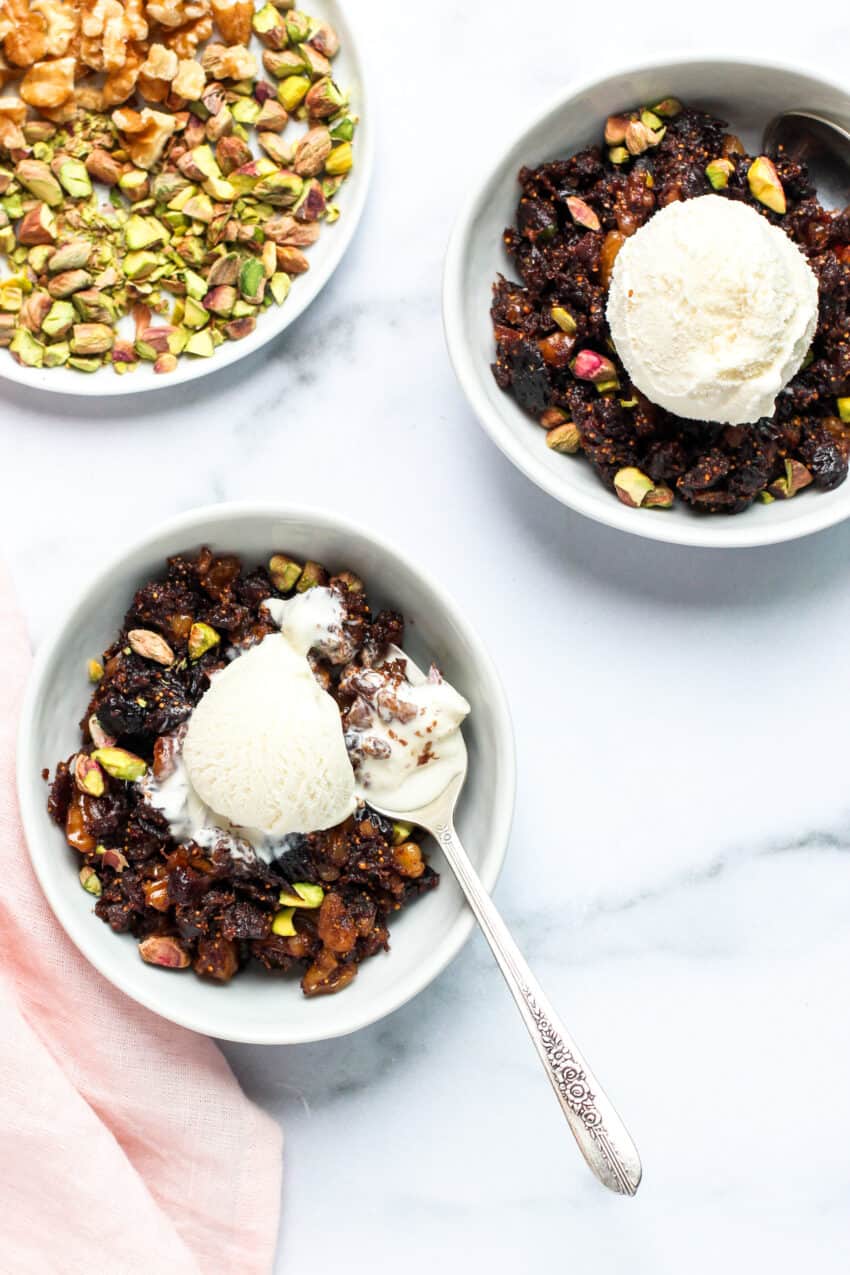 Fig halwa served in 2 bowls with vanilla ice cream 
