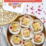 Kalakans in paper cups inside a gold tray