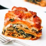 Lasagna served in a white plate