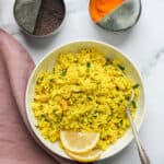 lemon cauliflower rice in a white bowl
