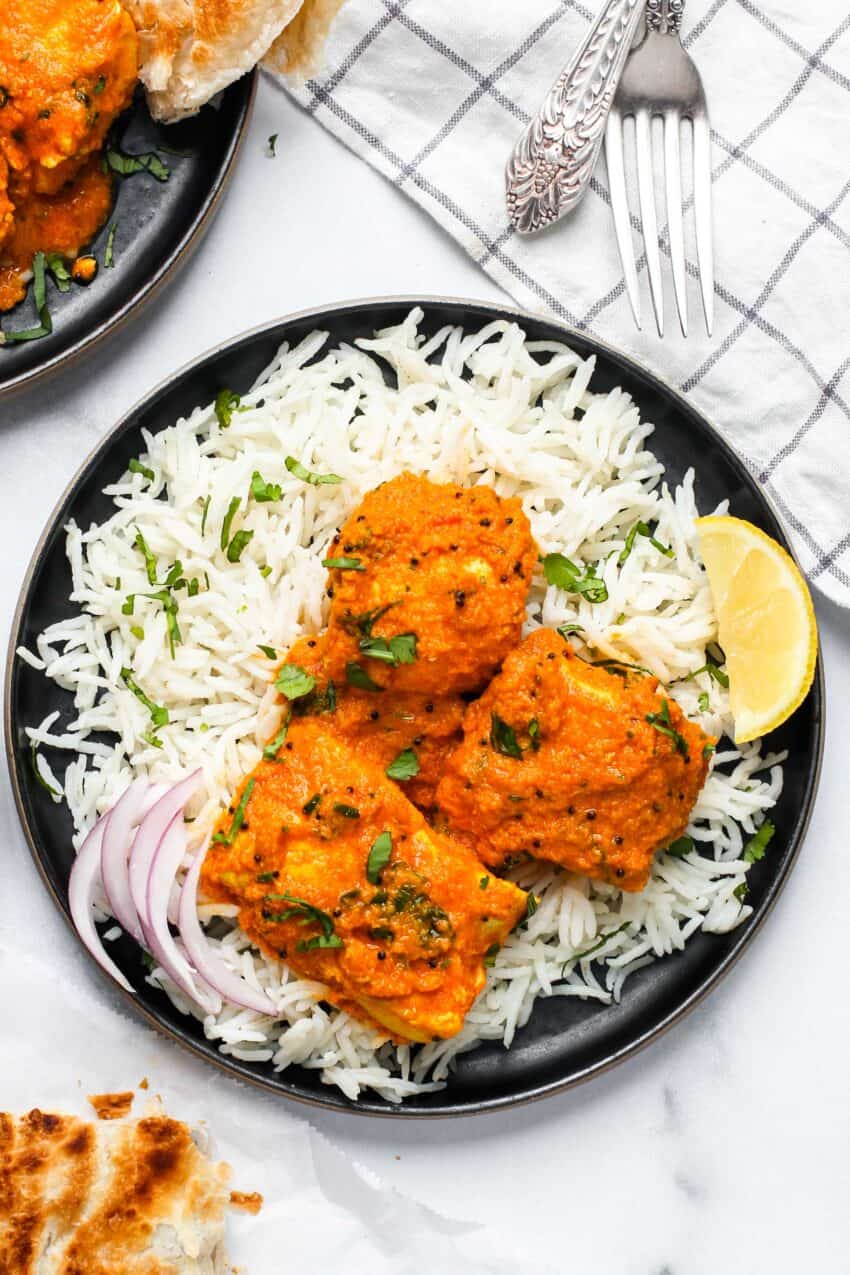 fish curry served with basmati rice