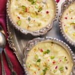 rice kheer served in silver bowls