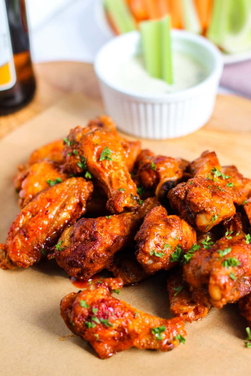 Buffalo chicken wings served with dip