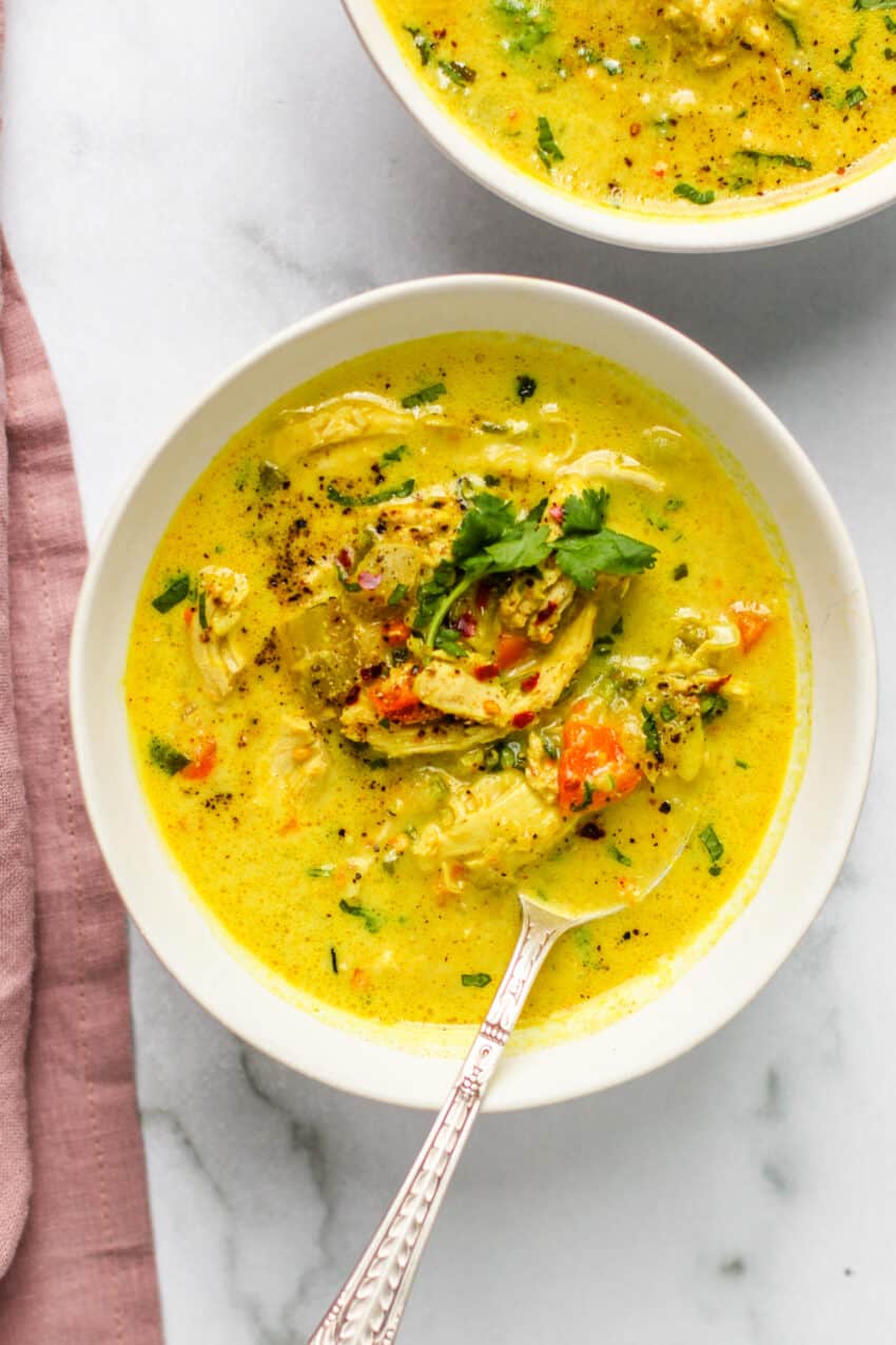 one bowl of soup with spoon in it