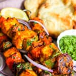 panner tikka sticks served with naan and chutney