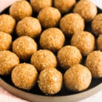 til laddu in a black plate