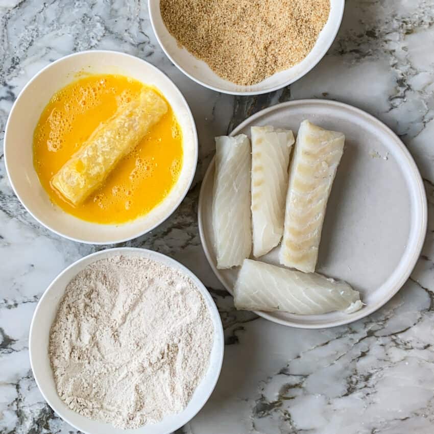 coating fish in egg mixture 
