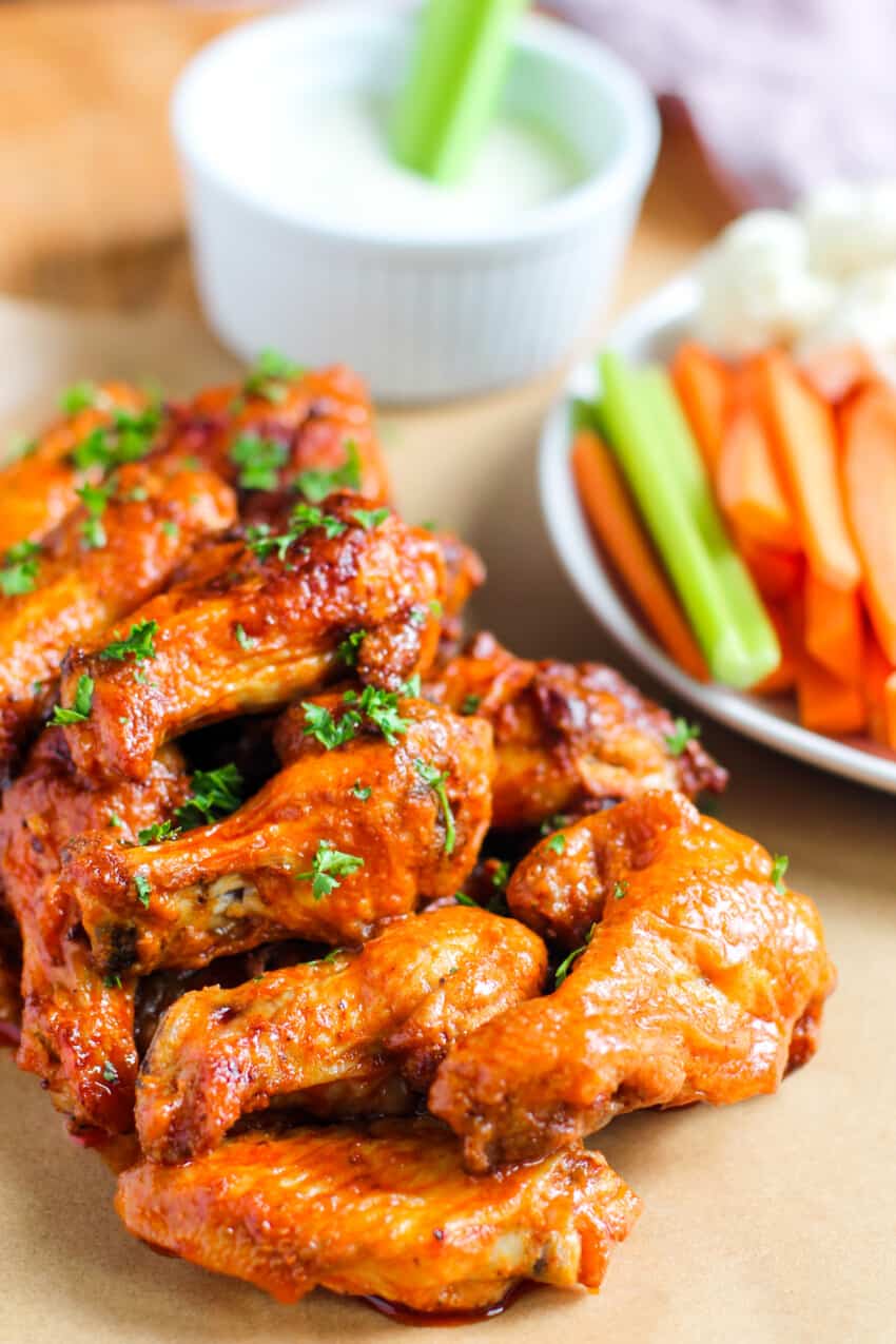 buffalo chicken wings serves with veggie sticks and bleu cheese