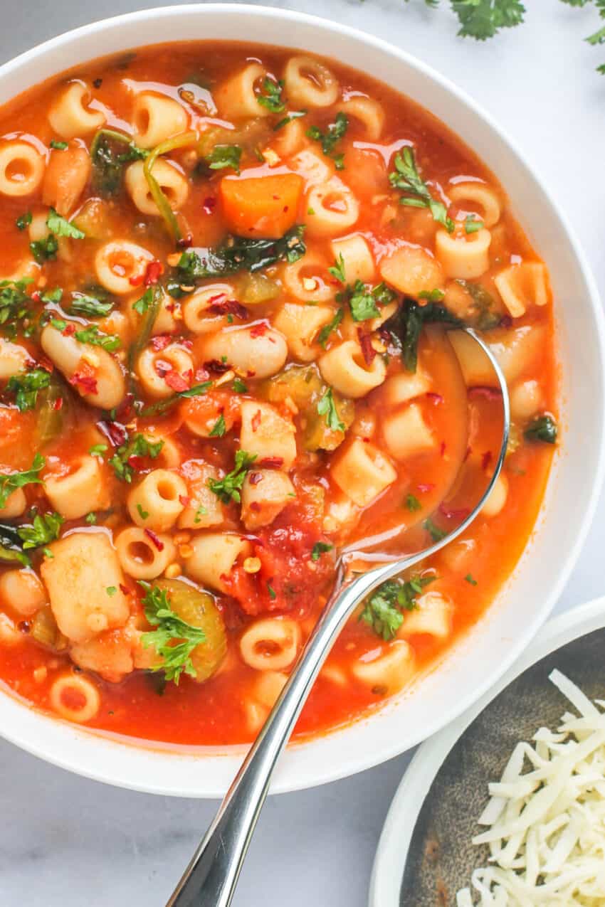 bowl of pasta e fagioli soup with spoon