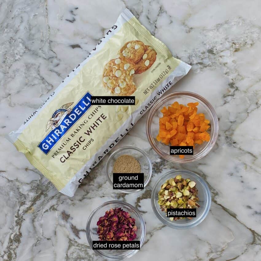 Ingredients - white chocolate chips, apricots, ground cardamom, pistachios, rose petals 