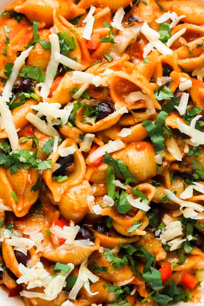 close up of taco pasta with beans and veggies 