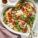 arugula salad in a heart shaped serving bowl