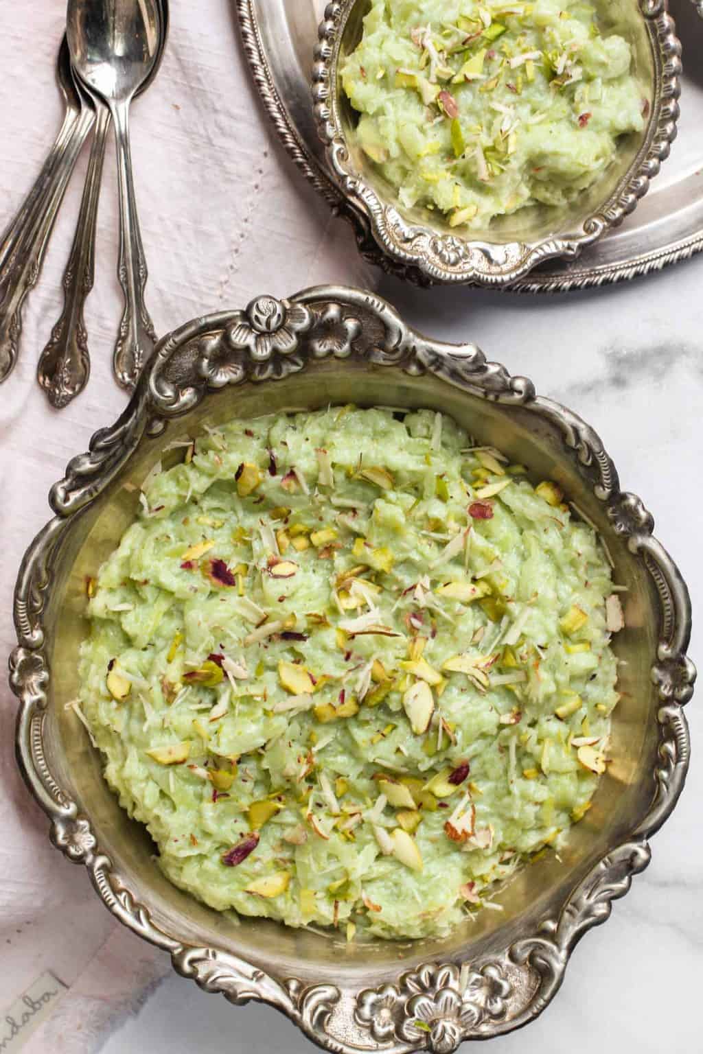 dudhi halwa served in a silver bowl 