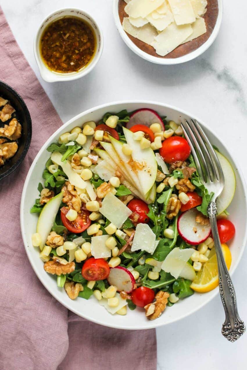 Arugula salad with lemon balsamic dressing and parmesan cheese