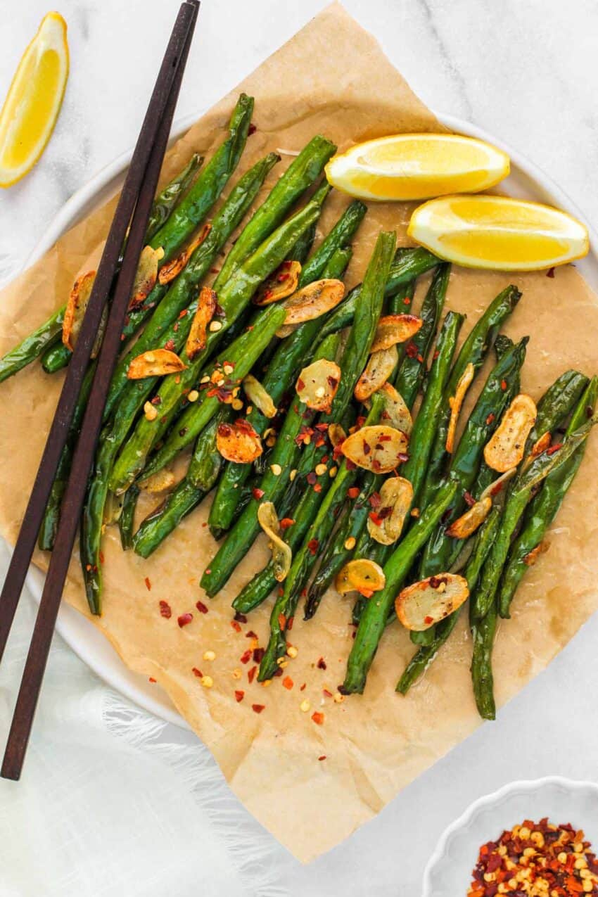 air fried green beans topped with fried garlic and red chili flakes 