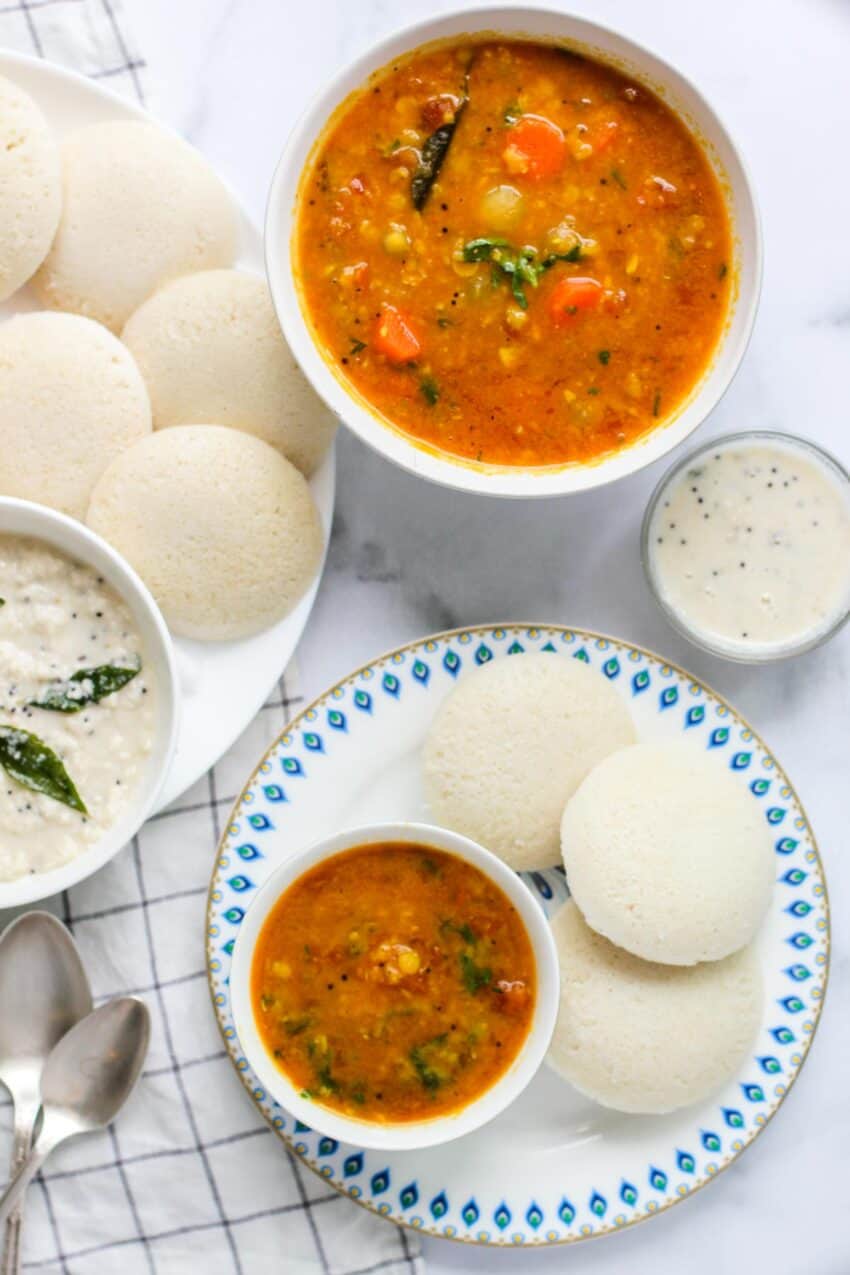 idlis served with coconut chutney and sambar