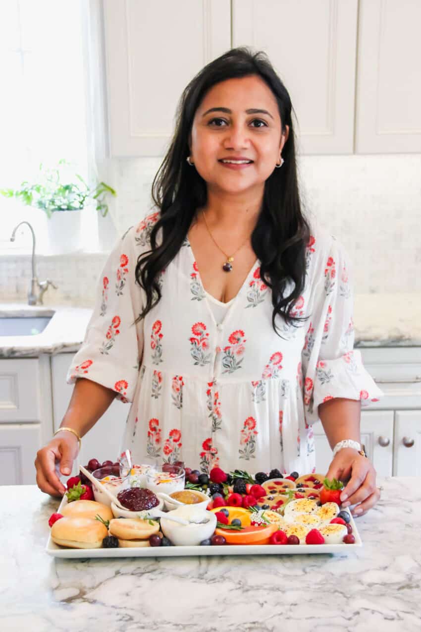 Author holding the Breakfast Board