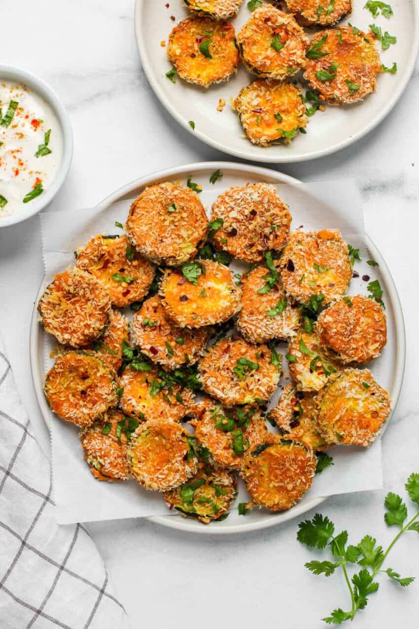 air fryer zucchini chips served with yogurt dip