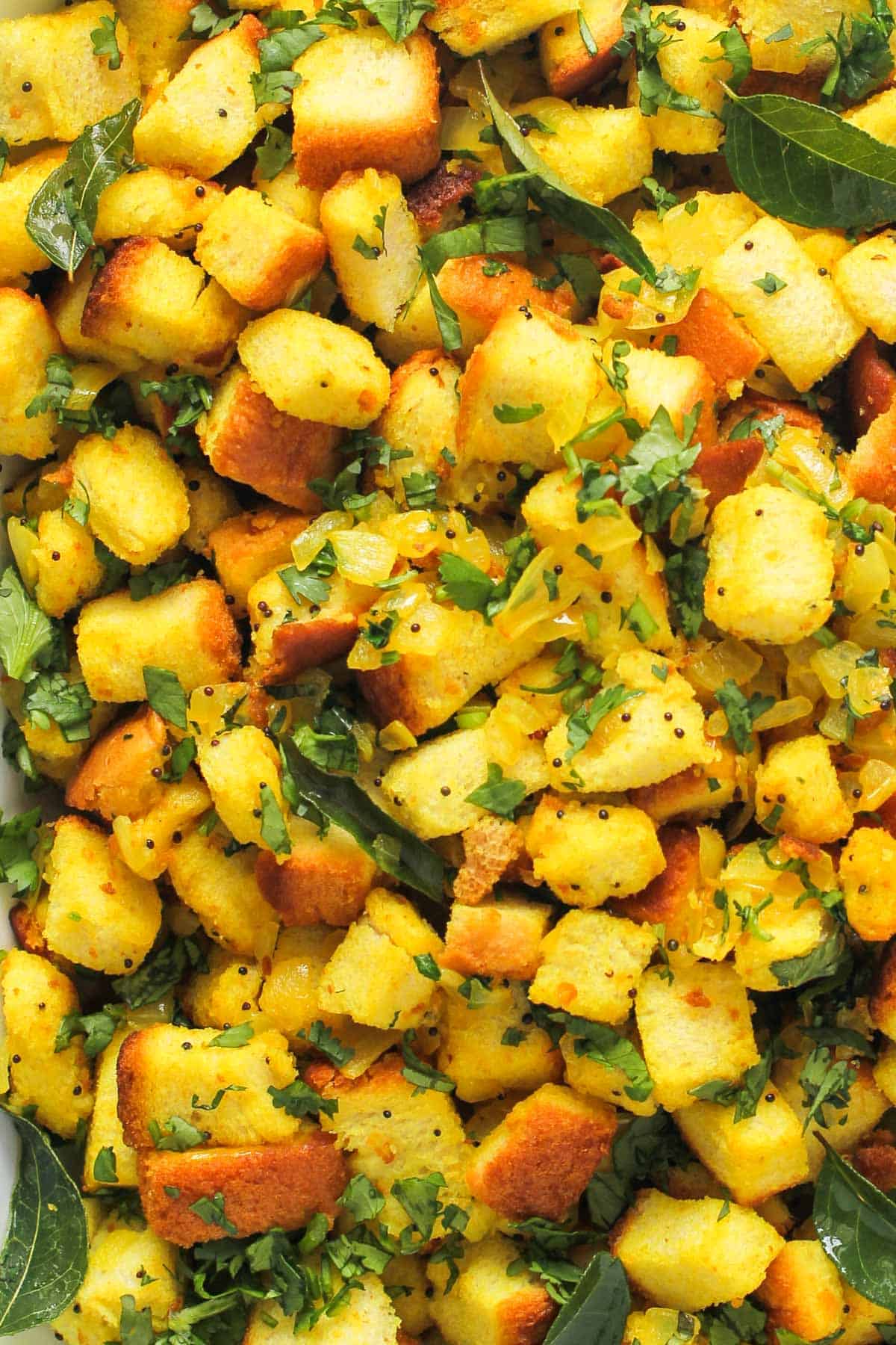 Bread Upma garnished with cilantro 