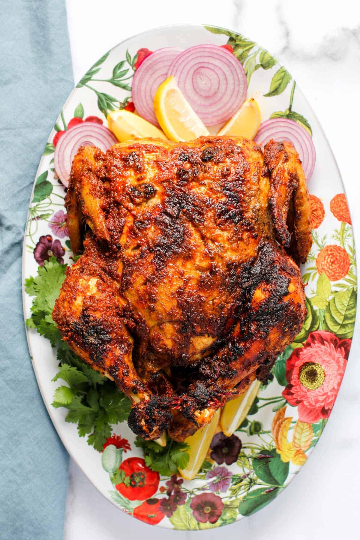 Tandoori chicken in a platter.