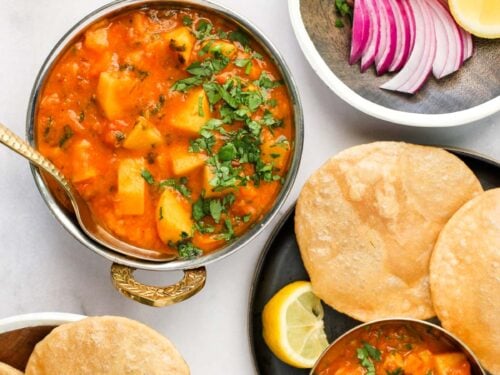 aloo rasedar served with puri