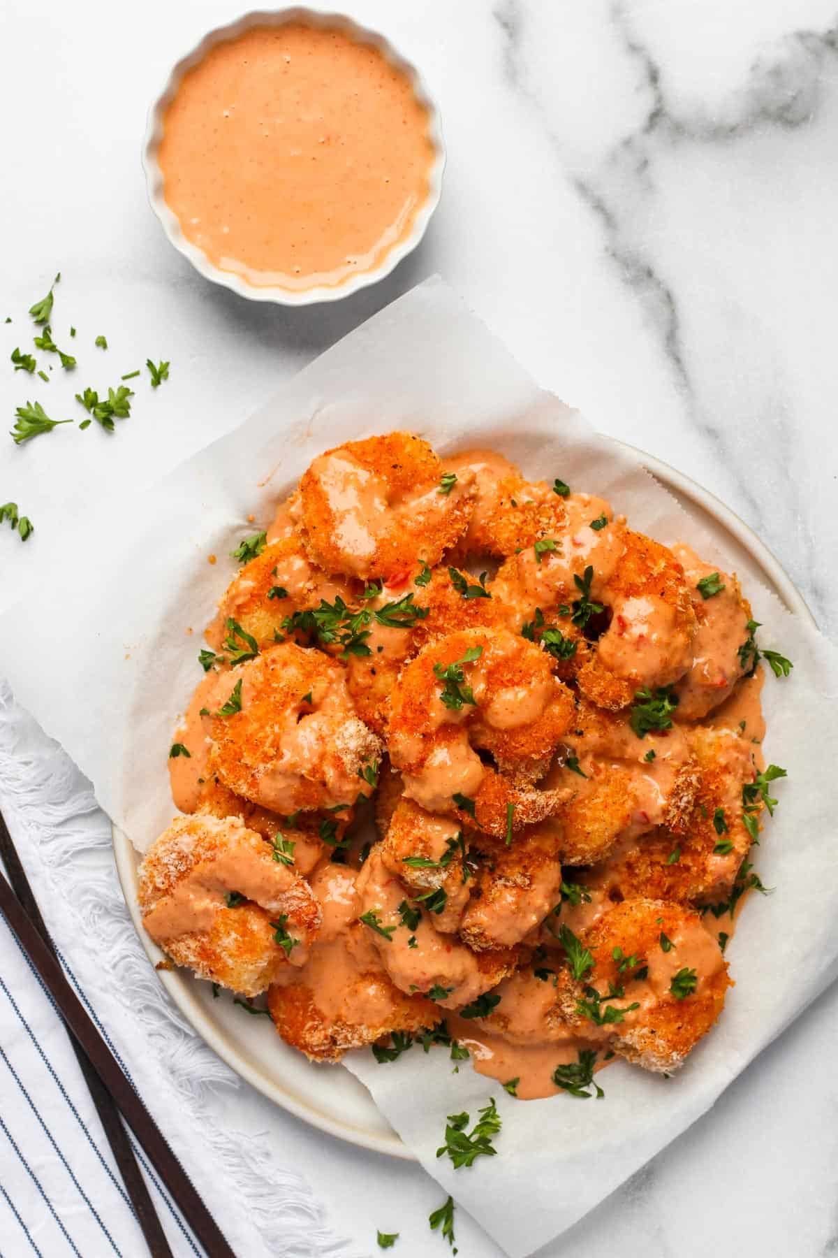 air fried shrimp drizzled with bang bang sauce 