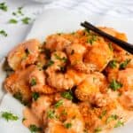 air fried shrimp drizzled with spicy sauce