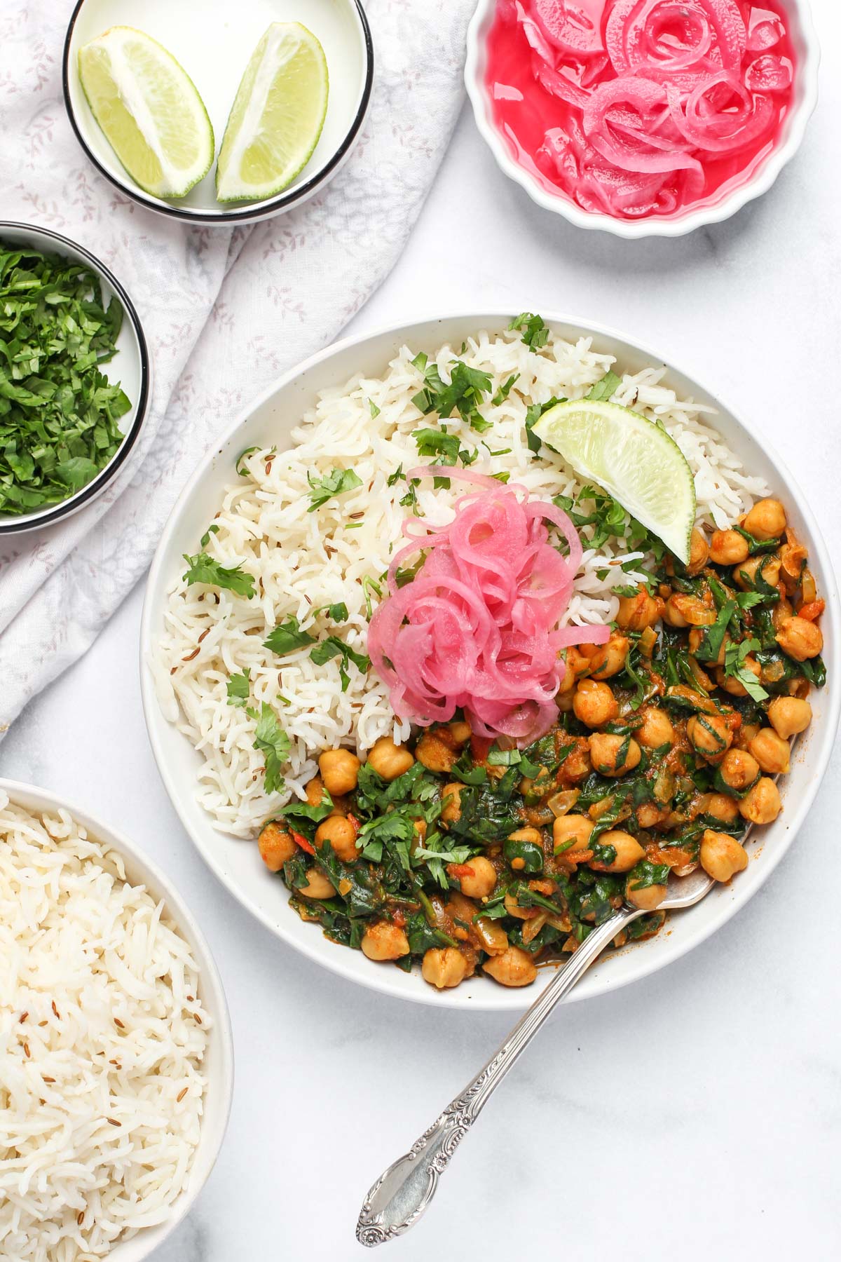 Chickpeas with spinach served with jeera rice