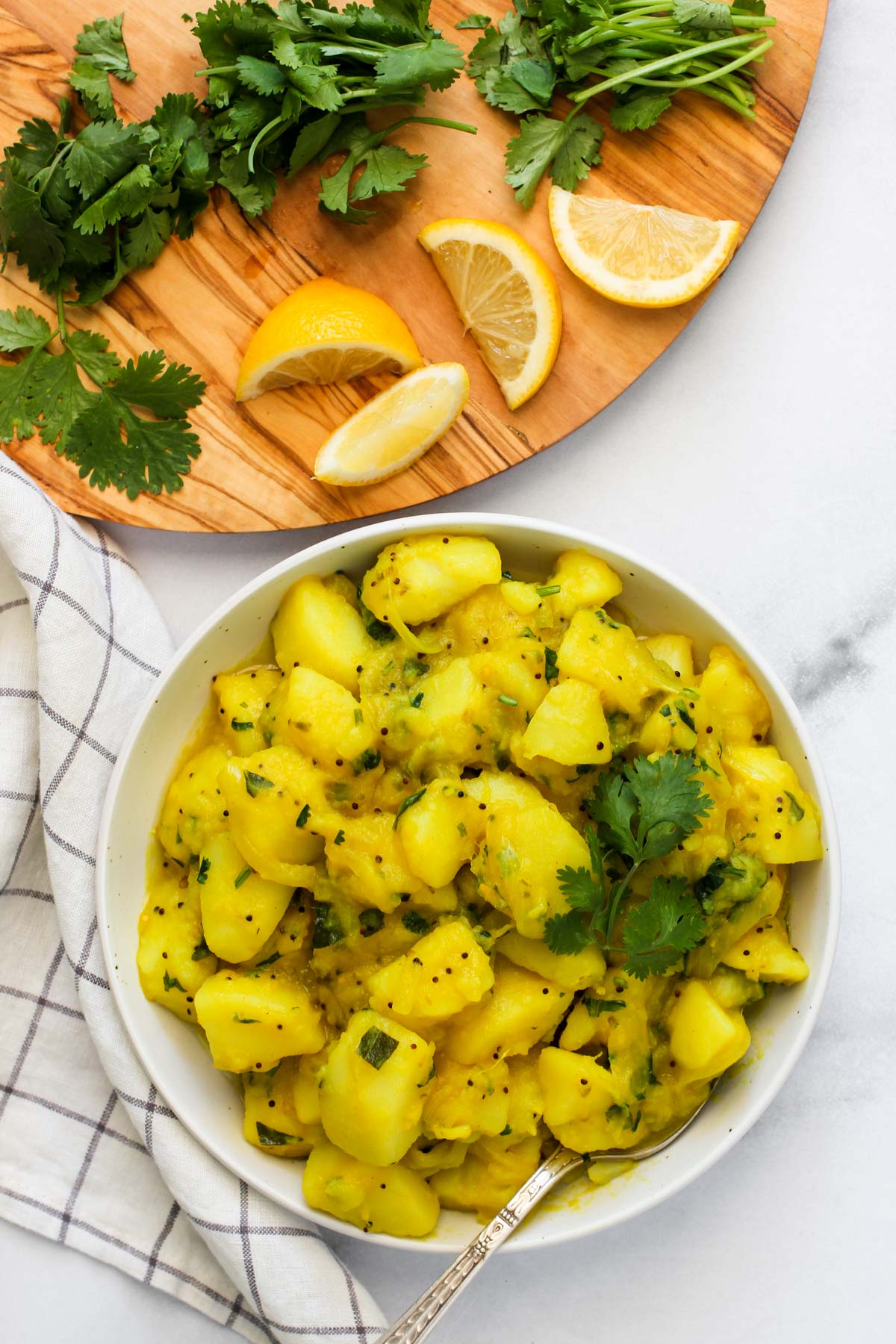 Batata Bhaji served in a white bowl 