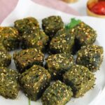 Kothimbir Vadi served with ketchup and chutney