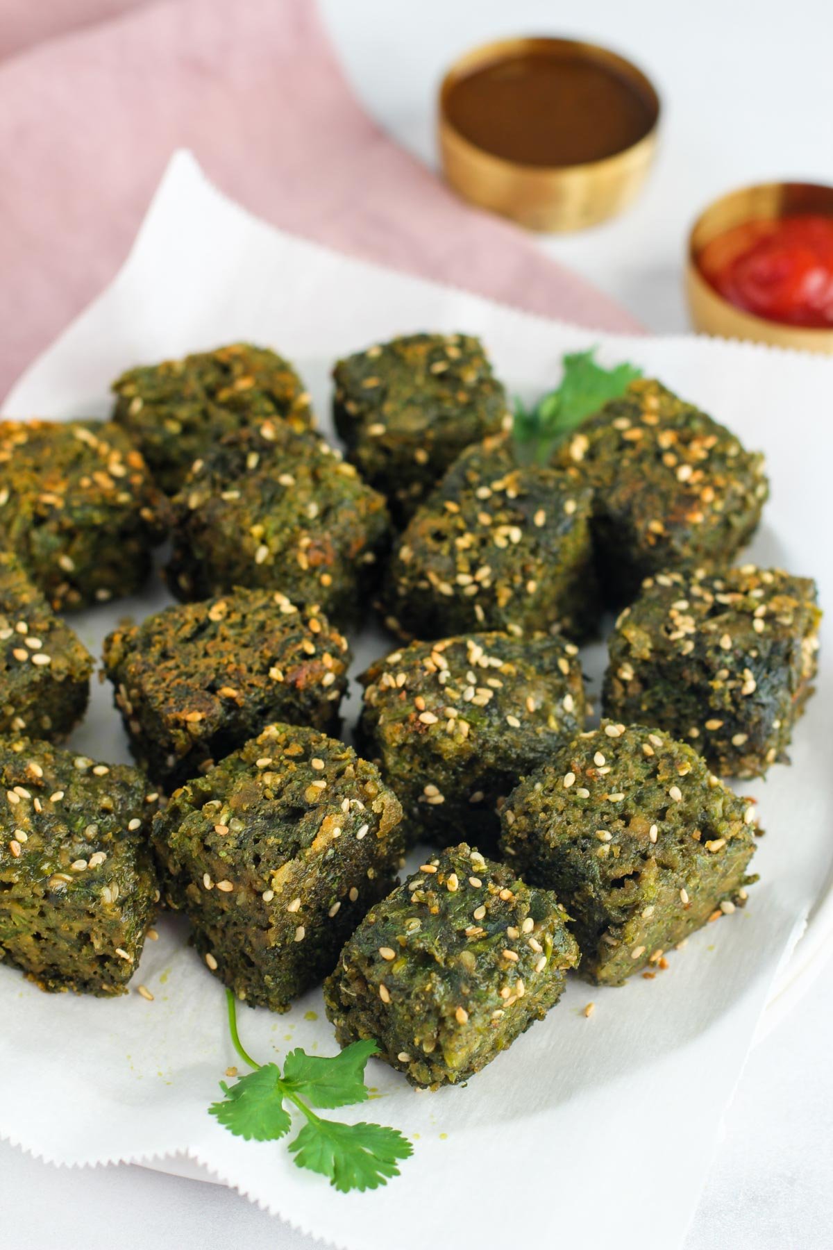 kothimbir vadi with ketchup and chutney  
