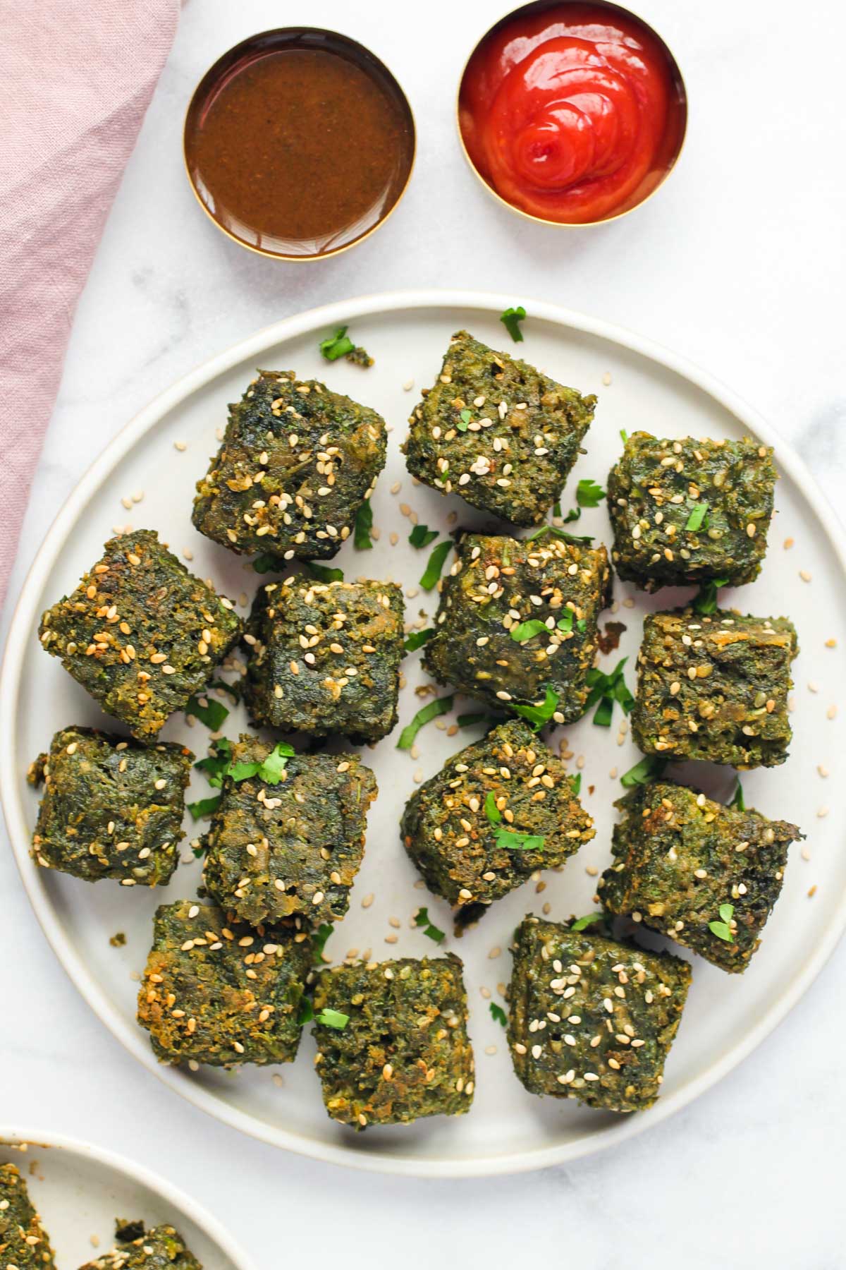 Kothimbir Vadi served with ketchup and chutney 