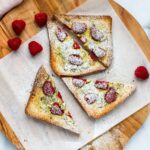 Yogurt Toast with raspberries and powdered sugar