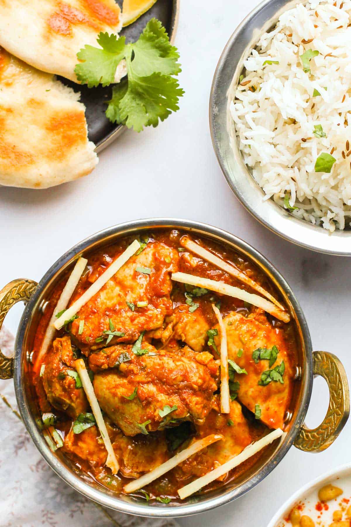 chicken curry served in a karahi 