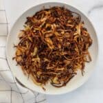 air fried onions in a white bowl
