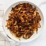 air fried onions in a white bowl