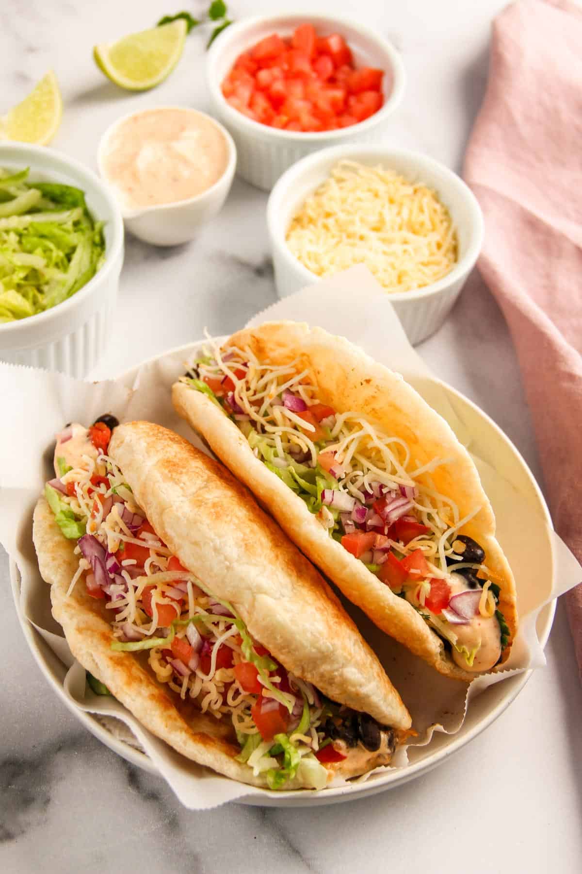 Two Black Bean Chalupas served in a white bowl